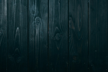 top view of vertical dark blue wooden planks surface for background