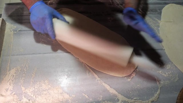 Eating and coocking concept.  Chef makes meat pide.