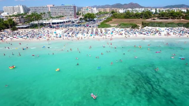 Aerial beach pull away.