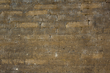 photograph of an old wall made of brick