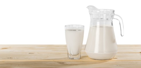 milk on table and sunny trees