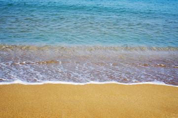 Soft wave of the sea on the sandy beach