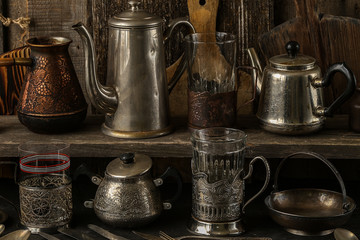 Fototapeta na wymiar Vintage silver cutlery on dark rustic background