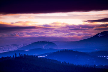Winter landscape in Carpathian Mountains at the sunrise