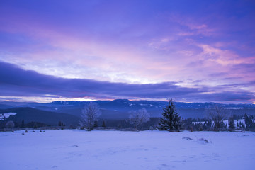 Fototapeta na wymiar Winter landscape in Carpathian Mountains at the sunrise