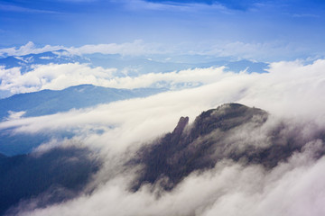 rain clouds and fog in the mountain of Ceahlu, Romania