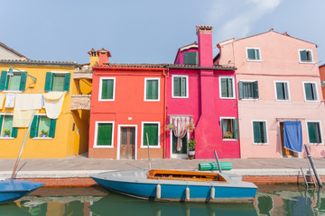 Fototapeta na wymiar Rectilinear view of the colored facades of buildings on the island of Burano, near Venice, Italy