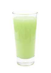 Tall glass of green juice isolated