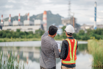 Asian male power plant engineer is working
