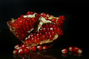 Pomegranate on a black background
