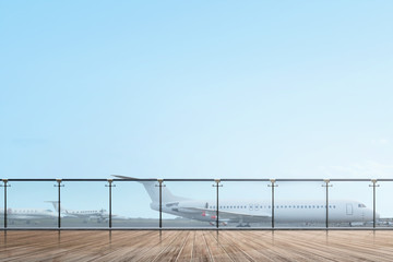 Airport terrace with wooden floor and airplane