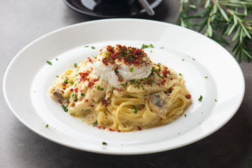 Pasta carbonara and poach egg and chicken