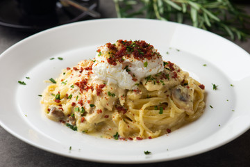 Pasta carbonara and poach egg and chicken