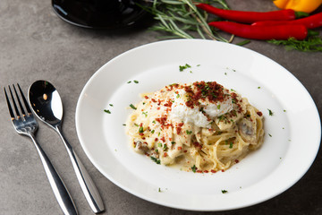 Pasta carbonara and poach egg and chicken