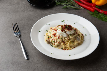 Pasta carbonara and poach egg and chicken