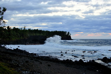 Reunion island seascape, landscape. Black sand, volcanic rocks.