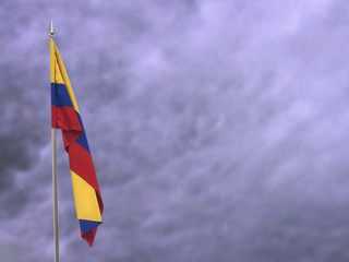Fototapeta premium Flag of Colombia hanging down dangling