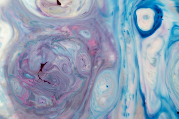 Closeup abstract color mixing of acrylic for use as background. Acrylic texture with marble pattern, marbling background 