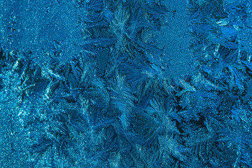 Fototapeta na wymiar Beautiful nature pattern on frosted glass for background. Toned