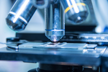 Microscope in blue tone.