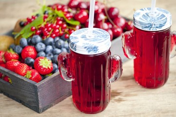 Homemade antioxidant summer fruits smoothie, berry juice assortment