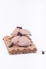 Ice cream with waffle on light background