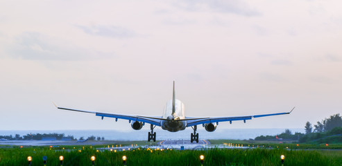 Back of the arriving airplane