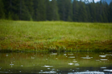 Fototapeta na wymiar Rain on a lake
