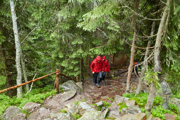 Young couple hiking in the highlands