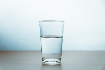 studio shot of a single glass of water