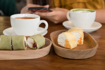 Hot Coffee and Matcha Green Tea On Wooden Table.