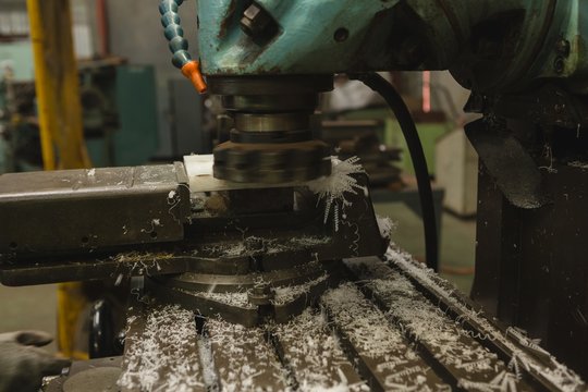 Waste material of plastic being cut into the milling machine