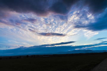 Obraz premium Clouds at the sunset