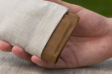 Leather Wallet on wooden table