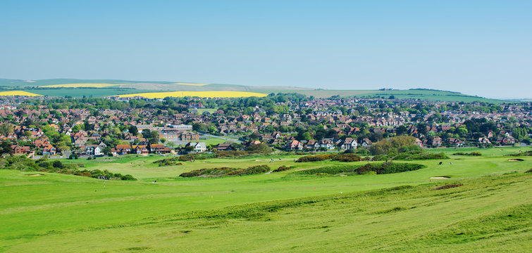 View of the town of Seaford from the cliff walk, houses, golf course, Seaford Head, East Sussex, England, selective focus