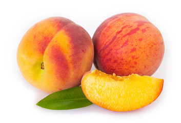 Fresh peaches on white background