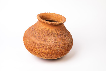 primitive clay pot on white background