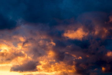 Storm clouds at sunset, dramatic sky