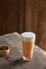 Ice cheese milk tea and bubble with chocolate cookies.