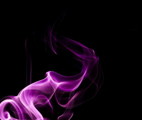 Obraz premium Purple smoke on black background