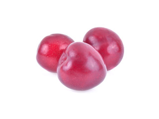 plums isolated on white