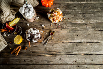 Autumn winter warm drinks, hot chocolate, pumpkin latte, caramel and peanut coffee latte, mulled...
