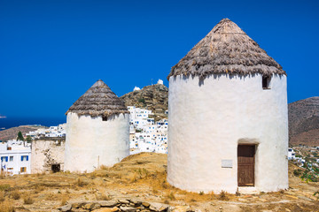 Iconic traditional wind mills in Ios island, Cyclades, Greece.