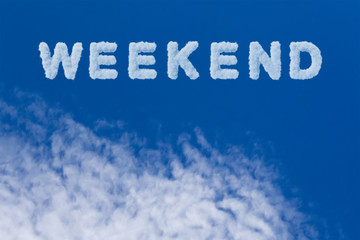 Fototapeta premium Weekend typography note on cloudy sky. Beautiful blue sky and cloud with weekend word