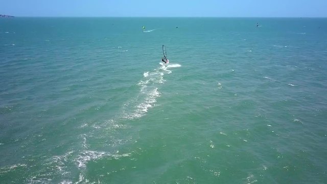 windsurfers group trains on open ocean 