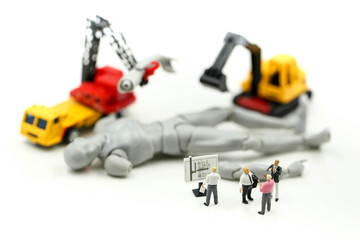 Miniature people : Businessman and Engineer deal production robots,industry  Robot Business concept.