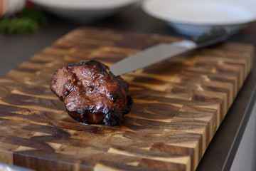 Char Siu with Knife on Butcher's Block Bokeh