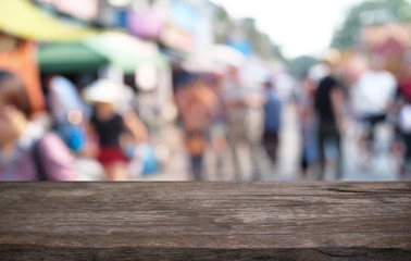 Empty dark wooden table in front of abstract blurred bokeh background of restaurant . can be used for display or montage your products.Mock up for space.