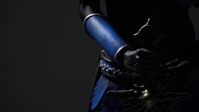 A female drow holding a sword, close up shooting