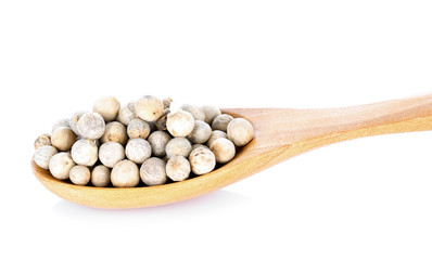 Pepper seed in wood spoon  on white background
